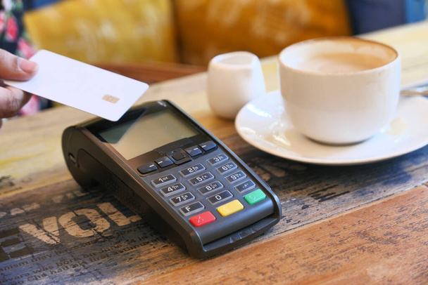Payment terminal charging from a credit card , close up - 写真・画像