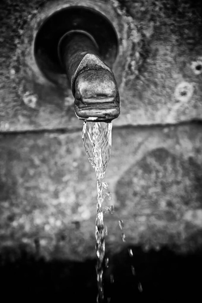 Spout with water, cool down and drink - Photo, Image