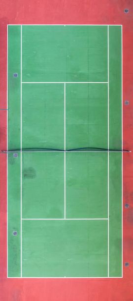 Downward aerial view of tennis court. - Photo, Image