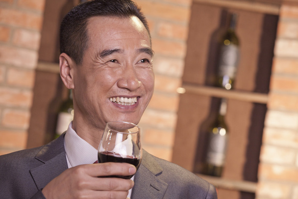 Businessman Holding Wine Glass - Φωτογραφία, εικόνα