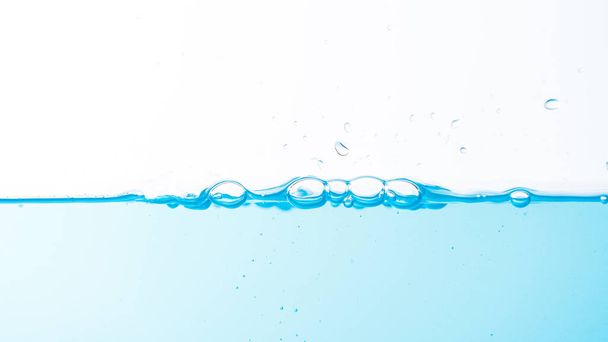 Water splash and ripple isolated on white background - Foto, afbeelding