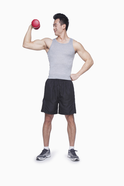Atleta levantando mancuerna
 - Foto, imagen