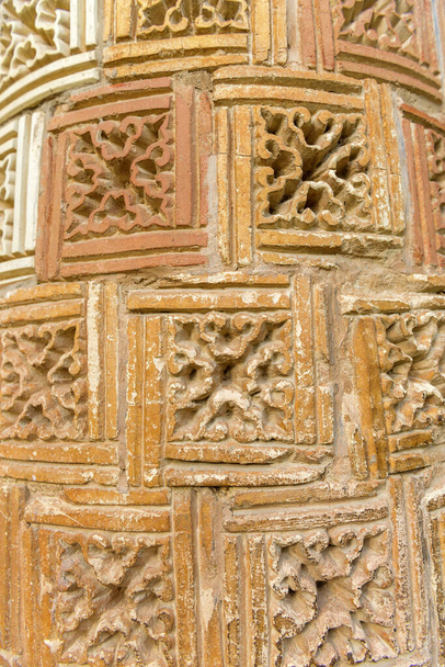 Ornaments in stone. A close up of a carved Turkistan design on a stone wall. Kazakhstan. 27 May, 2016. Russia. - Photo, Image