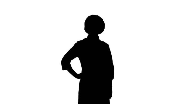 Portré fekete sziluett szakács lány egy toque és kötény áll elszigetelt fehér háttér - Fotó, kép