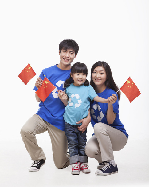 Famiglia sventola bandiere cinesi
 - Foto, immagini