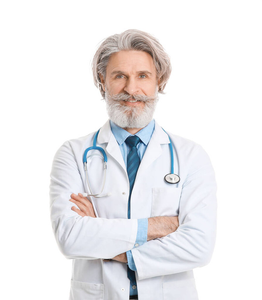 Portrait of senior male doctor on white background - Photo, Image