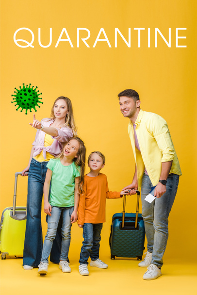 happy family of travelers with luggage, passports and tickets pointing at bacteria on yellow, quarantine lettering - Foto, Imagem