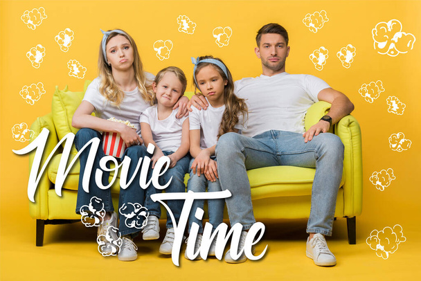 sad family watching movie on sofa with popcorn bucket on yellow, movie time and popcorn illustration - Photo, Image