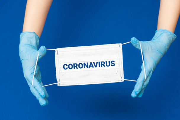 Medical gloves and mask. Coronavirus pandemic.  - Φωτογραφία, εικόνα