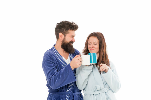 Enjoying the company of each other. perfect morning of love couple. Happy couple in bathrobes with coffee. happy romantic girl having breakfast with husband. couple lifestyle moments at home - Foto, Imagen