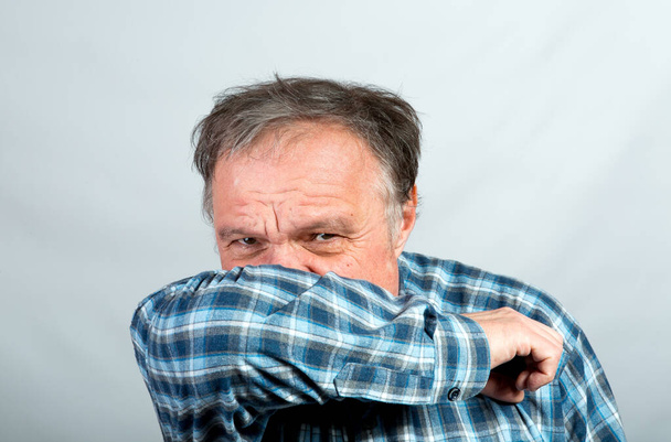 During a pandemic, a person must cough correctly - Photo, Image