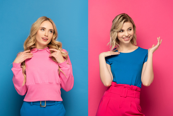 glimlachende blonde zussen weg te kijken op roze en blauwe achtergrond - Foto, afbeelding