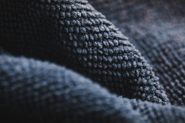 Textura tkaniny, zvlněné záhyby struktury textilního materiálu. - Fotografie, Obrázek