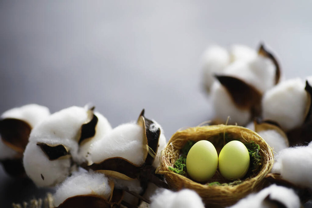 Bird's nest with eggs. Willow branches first greens. Easter background. Palm Sunday. Christian holiday. Spring background. - Photo, Image