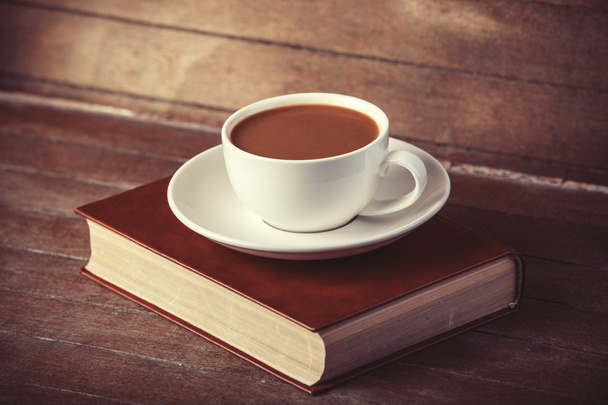 Tazza di caffè con libro
 - Foto, immagini