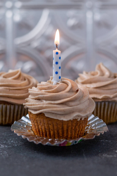 Birthday cupcake with a candle  - Fotoğraf, Görsel