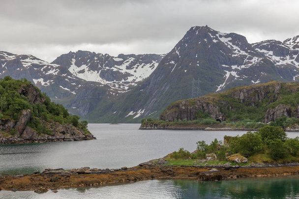 view of the norwegian fjords. green hills, snowy peaks - Foto, immagini