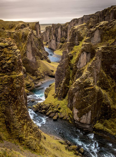 A vertical shot of the Fjardarargljufur Canyon in Iceland - Fotó, kép