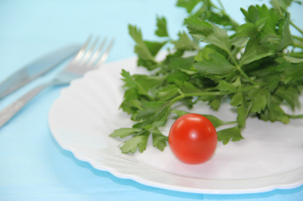 Tomato and herb on a plate - Photo, Image