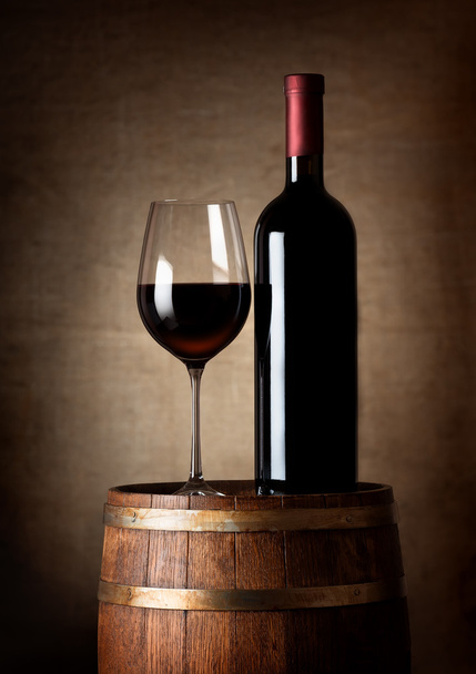 Wine on a barrel - Фото, зображення