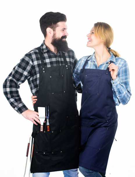 Family cooking grilled food. Cooking together. Couple in love getting ready for barbecue. Man bearded guy and girl ready for barbecue white background. Picnic and barbecue. Backyard barbecue party - Foto, Bild