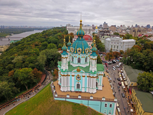 Aerial drone view. St. Andrews Church in Kyiv in early spring on sunny day - Photo, Image