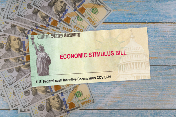 Acordo de estímulo do Senado inclui cheques individuais plano de estímulo econômico do vírus Nota de dinheiro do dólar dos EUA sobre pandemia global Bloqueio do Covid 19
 - Foto, Imagem