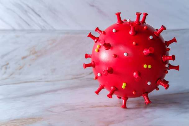 Deadly epidemic coronavirus cell model concept in closeup - Fotografie, Obrázek