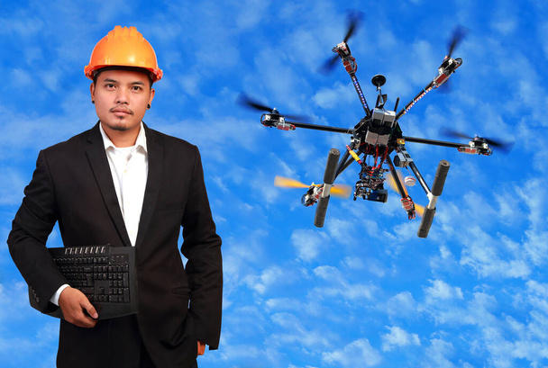 Flying drone with engineer. - Photo, Image