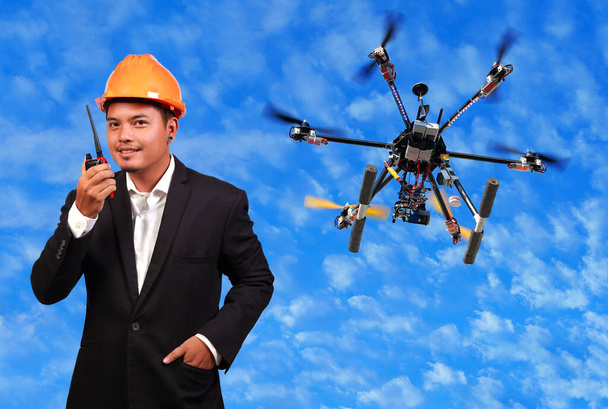Flying drone with engineer. - Photo, Image