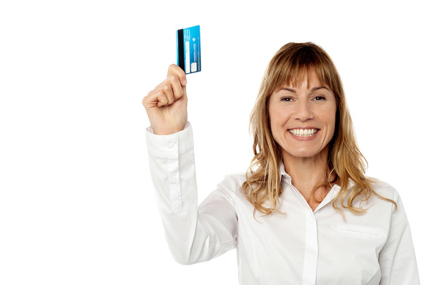 Businesswoman displaying cash card - Foto, afbeelding