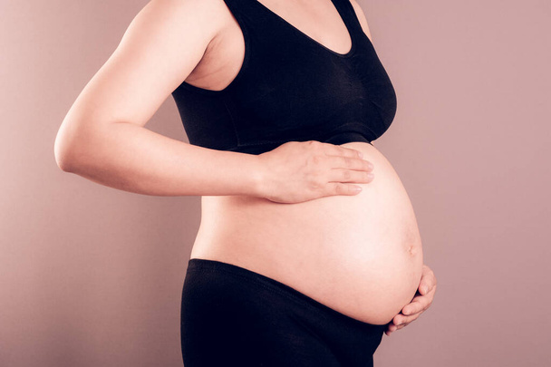 closeup belly of pregnant woman, pregnancy concept - Foto, Imagem