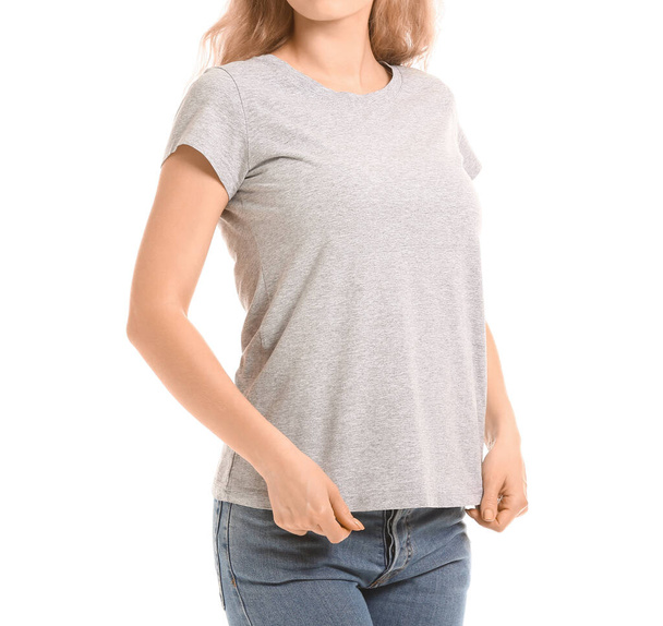 Woman in stylish t-shirt on white background - Fotoğraf, Görsel