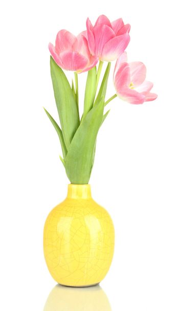 Pink tulips in bright vase, isolated on white - Fotografie, Obrázek