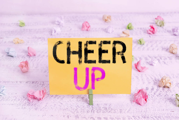 Text sign showing Cheer Up. Conceptual photo to live every moment as the last love your life work family Green clothespin white wood background colored paper reminder office supply. - Photo, Image