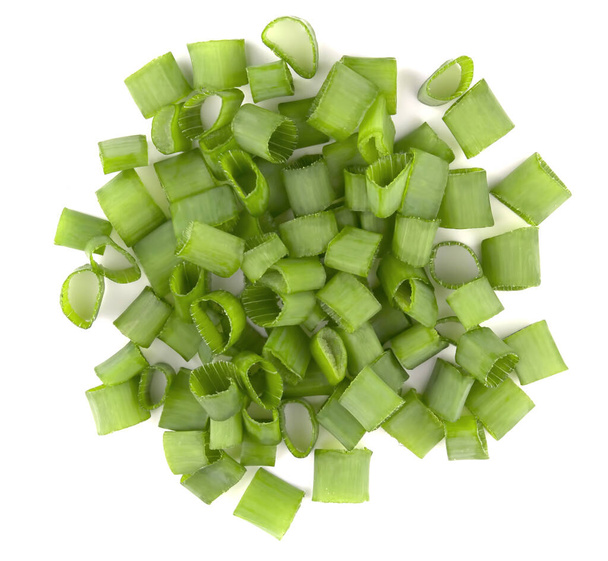 Premium Photo  Green onions chopped in a light bowl. isolate on a white  background, top view.