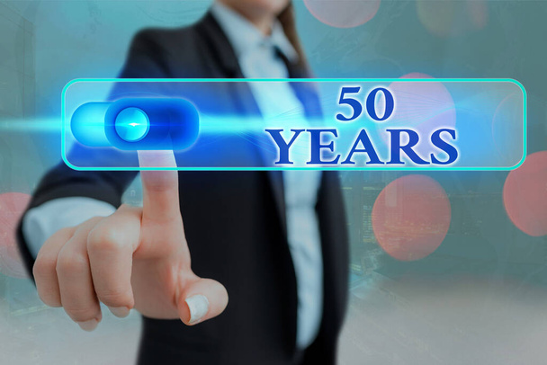 Conceptual hand writing showing 50 Years. Business photo showcasing Honoring Ruby Jubilee Commemorating a special day Semicentennial. - Photo, Image