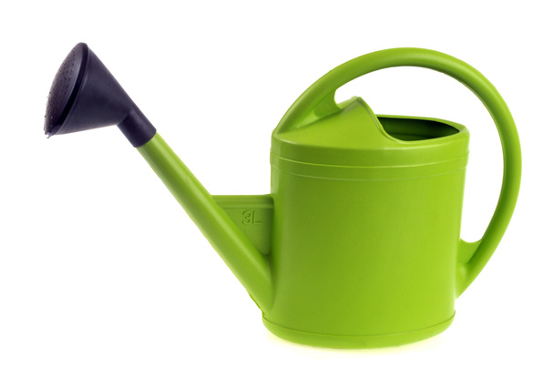 Green watering can close up on white background - Photo, Image