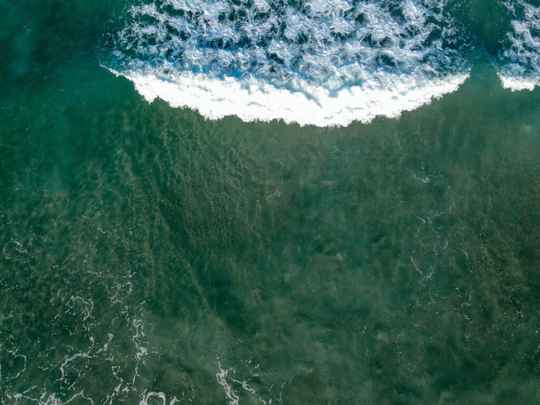 Bali island paradise beach in Indonesia, ocean and golden sand, drone photo - Foto, Imagem
