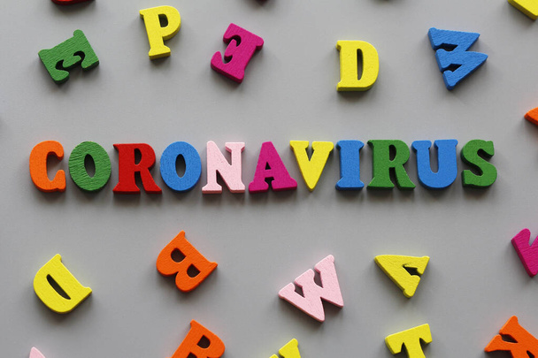 Written by CORONAVIRUS on a gray background. Quarantine all over the world. Coronavirus Prevention Pandemic of the 21st century. Epidemic prevention. - Photo, Image
