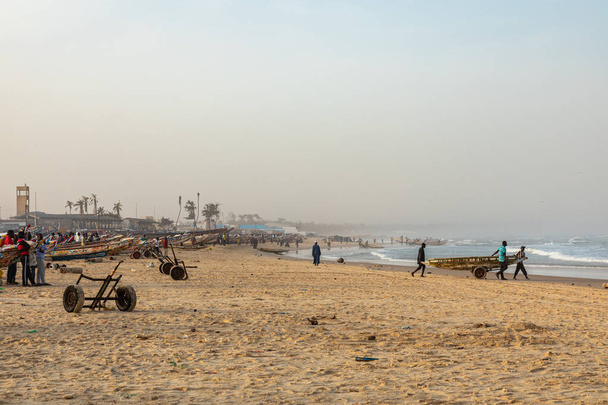 KAYAR, SENEGAL - NOVEMBER 14, 2019: Traditional fishing village of Kayar, Senegal. West Africa. - Fotó, kép