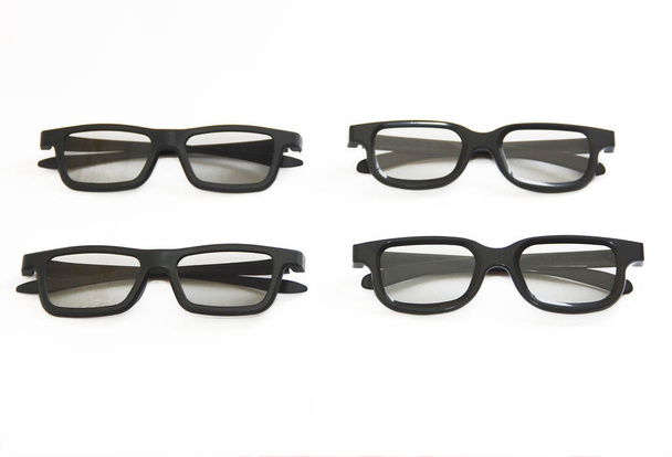 γυαλιά με φακούς σε μαύρο πλαστικό α πλαίσια - Φωτογραφία, εικόνα