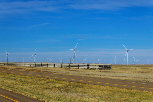 A wind turbine farm in rural West Texas on highway - Photo, Image