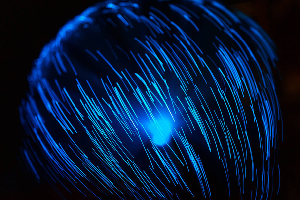 Blue abstract particles and lines with bokeh and blur in dark background - Photo, Image