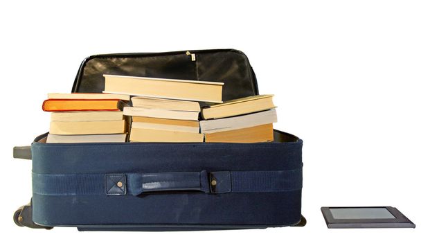 Suitcase full of books with eBook reader - Foto, afbeelding