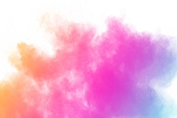 Explosion de poudre colorée sur fond blanc. Éclaboussures de particules de poussière de couleur pastel
. - Photo, image