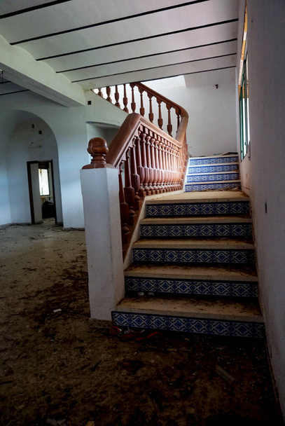 abandoned old blue and brown staircase inside a house - Photo, Image