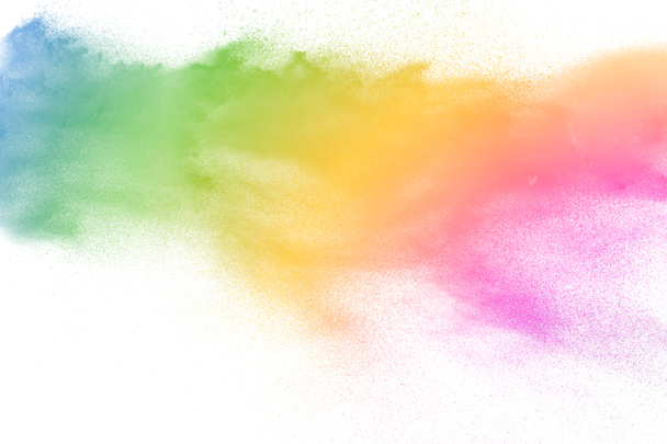 Abstract multicolored powder explosion on white background.Colorful dust explode. Painted Holi powder festival. - Photo, Image