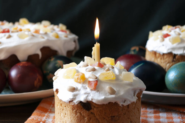 Traditional Orthodox Easter bread the kulich, russian food, religion, painted eggs, candle - Photo, Image