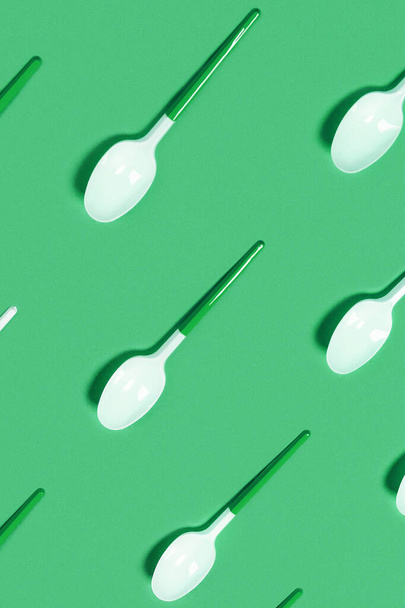 Pattern of withe spoon on blue background. Flat lay, top view. - Photo, Image